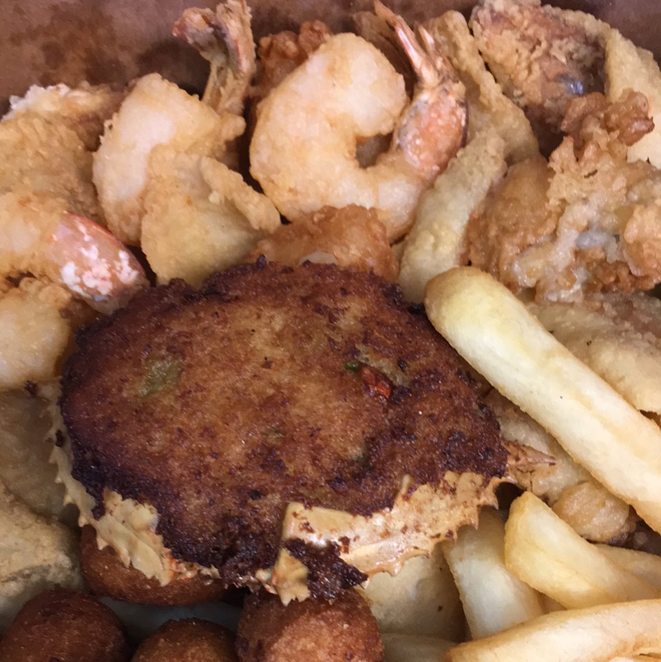 Fried fish dinners served with simple sides.